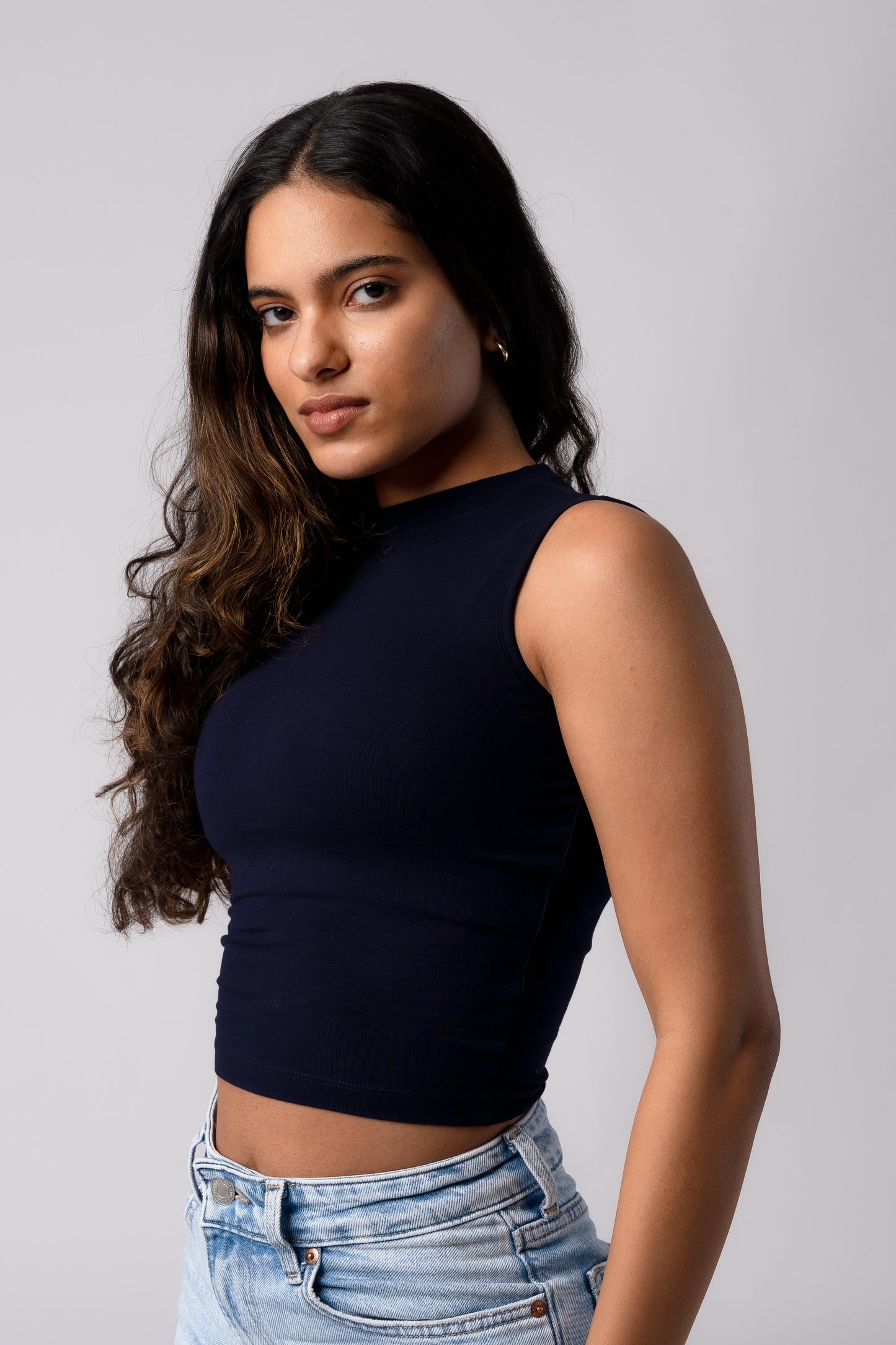 Sleeveless High Neck Crop Top with in built bra padding