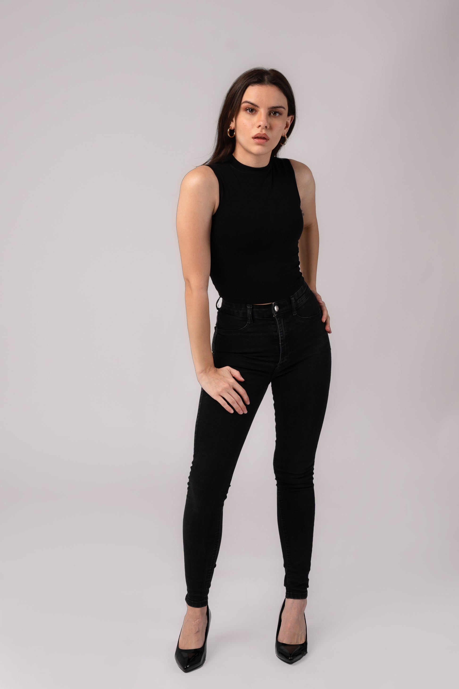 Sleeveless High Neck Crop Top with in built bra padding