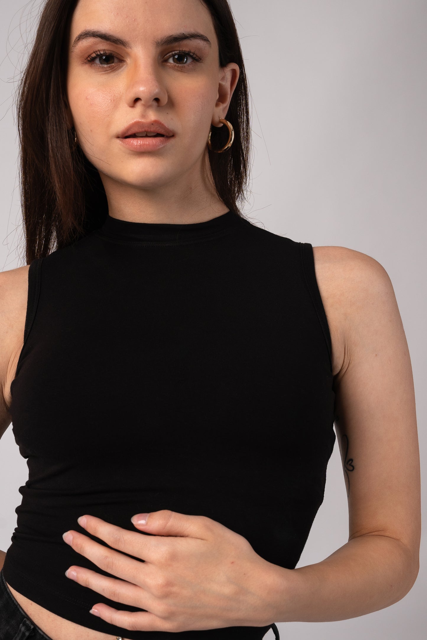 Sleeveless High Neck Crop Top with in built bra padding