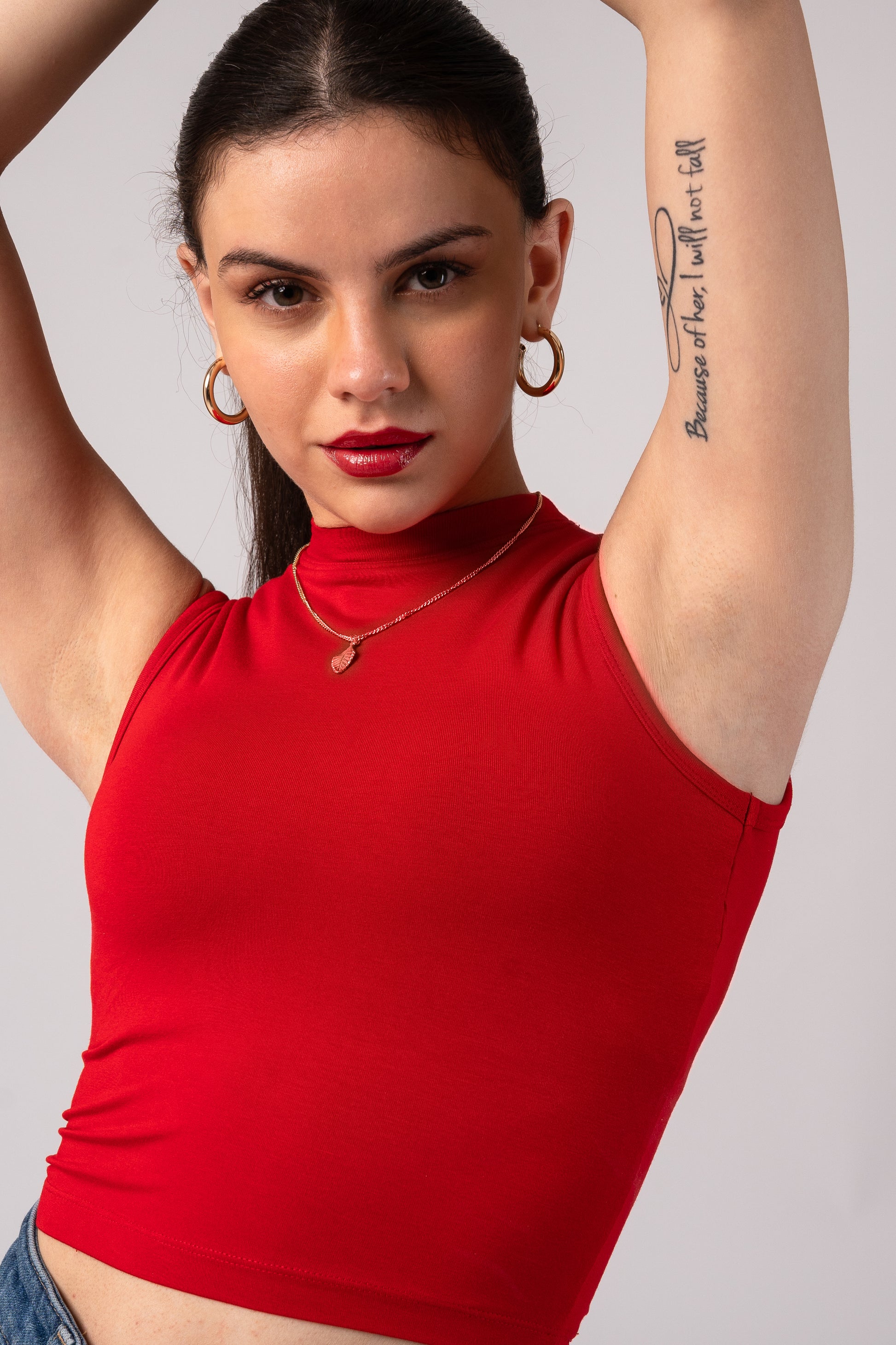 Sleeveless High Neck Crop Top with in built bra padding