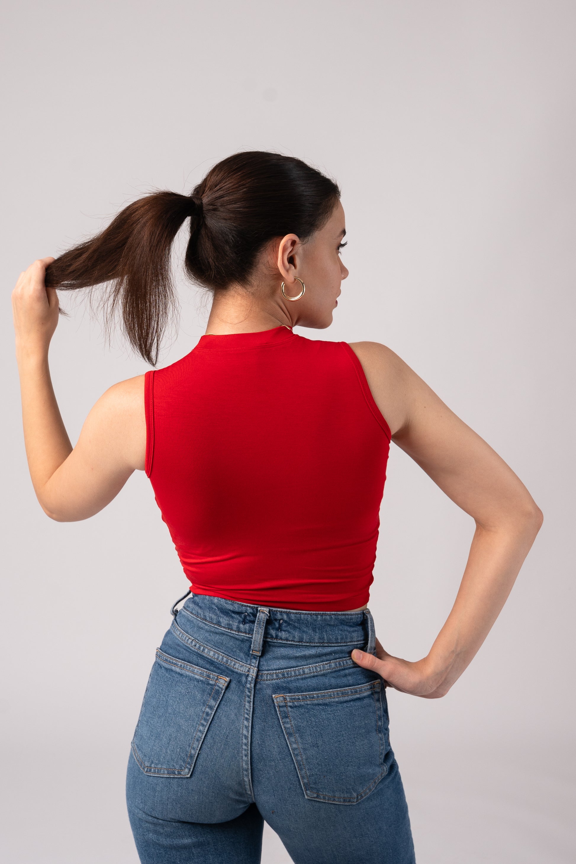 Sleeveless High Neck Crop Top with in built bra padding
